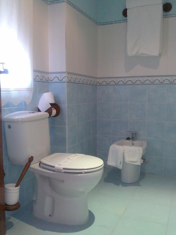 Hostal Rural La Casa Verde Cheles Rum bild